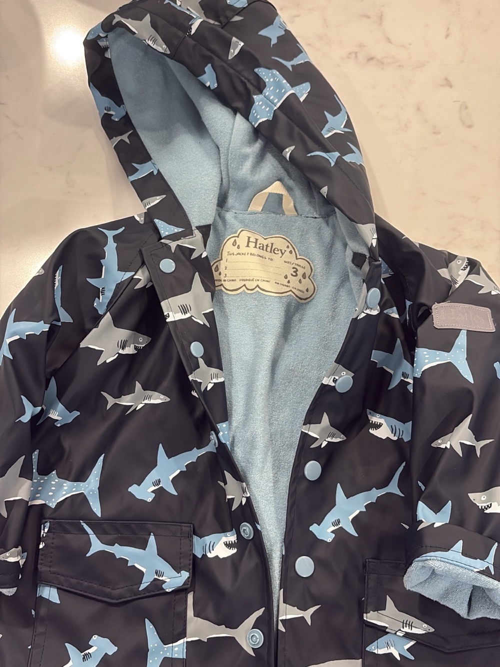 Hatley Kids Shark-Print Hooded Raincoat in Black and Light Blue